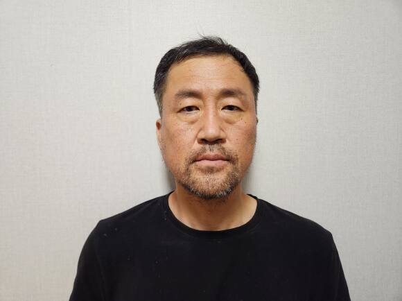 스토킹하던 여성을 살해한 뒤 달아났다 나흘 만에 붙잡힌 윤정우(48). 대구경찰청 제공